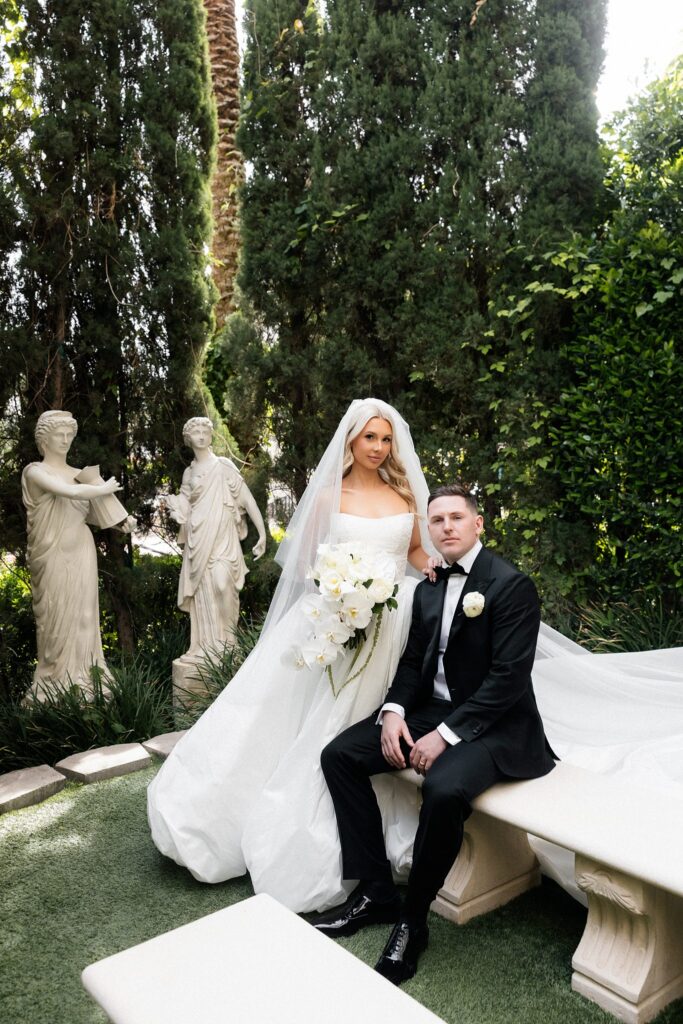 Outdoor bride and grooms portraits inside Venus Garden Caesars Palace.