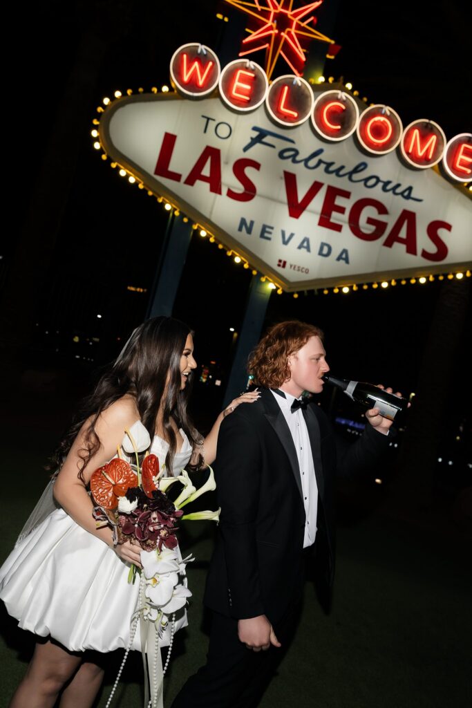 Couple having champagne during their elopement.